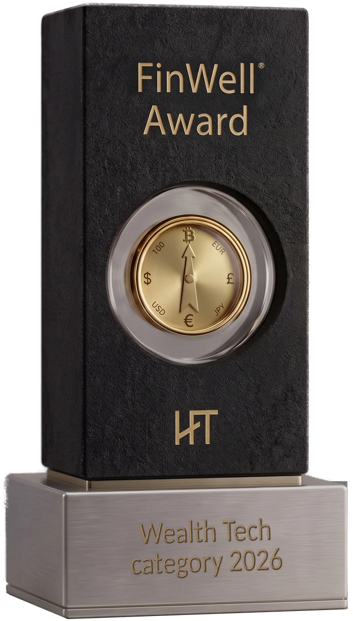 The FinWell Award trophy: a black block with a gold compass dial and the HoFT monogram on a brushed-steel plinth